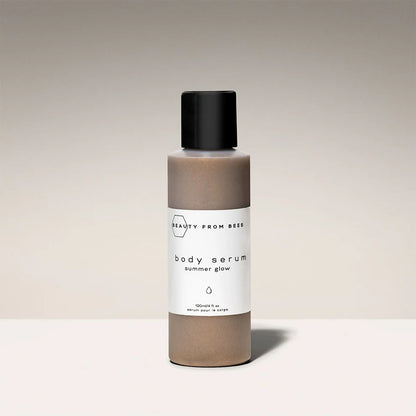 Summer glow shimmer body serum with gold mica